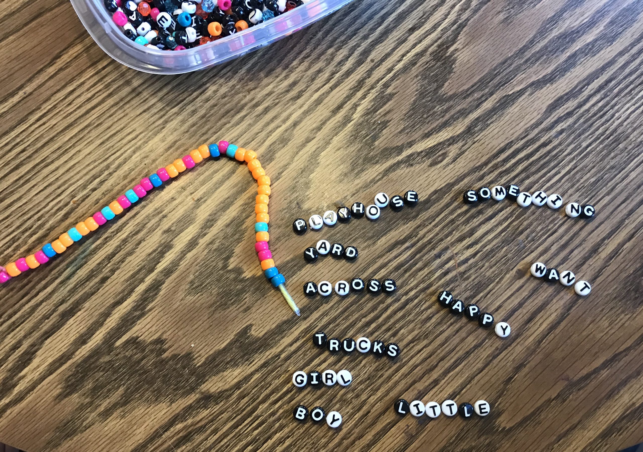Pony beads for spelling activity